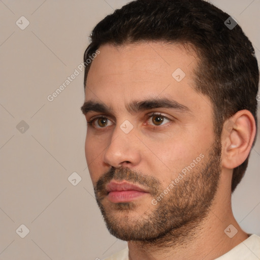 Neutral white young-adult male with short  brown hair and brown eyes