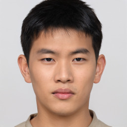 Neutral asian young-adult male with short  brown hair and brown eyes