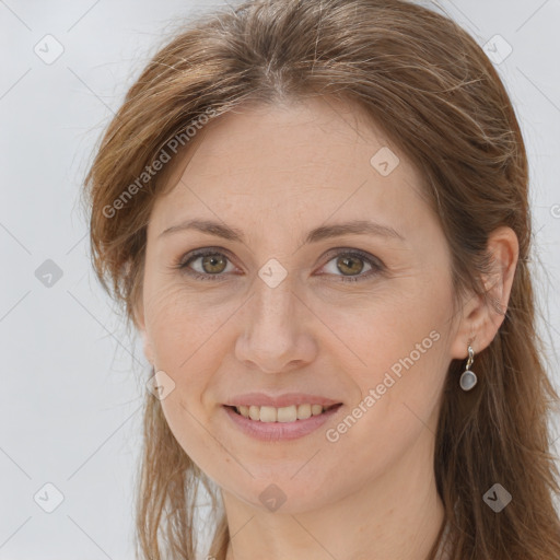 Joyful white adult female with long  brown hair and grey eyes