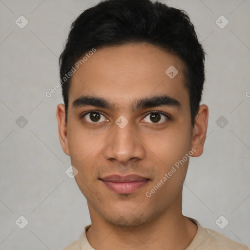 Joyful latino young-adult male with short  black hair and brown eyes