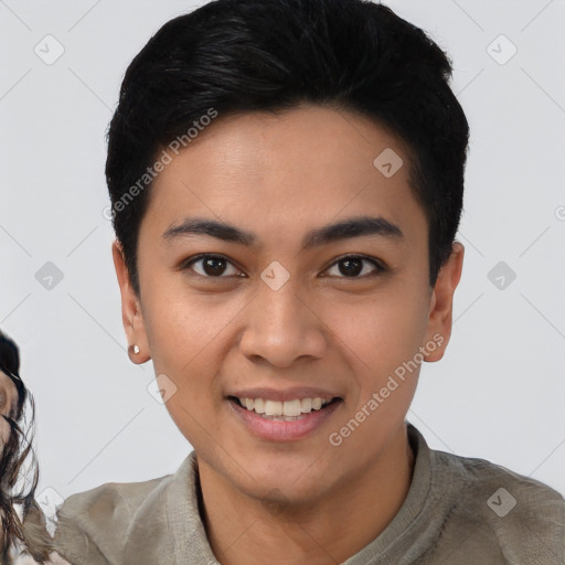 Joyful latino young-adult female with short  black hair and brown eyes