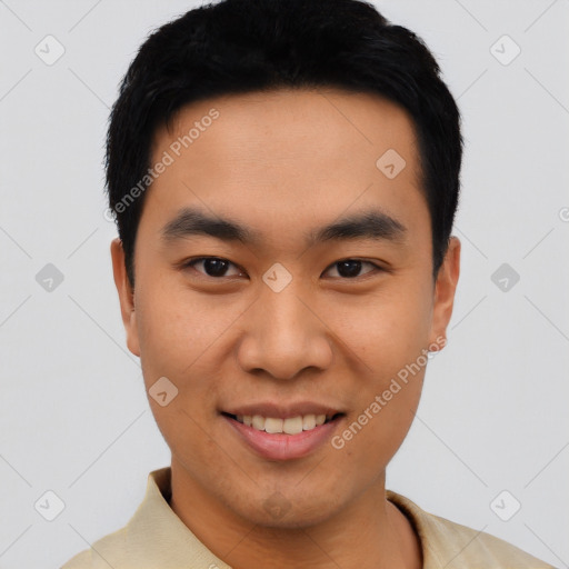 Joyful asian young-adult male with short  black hair and brown eyes