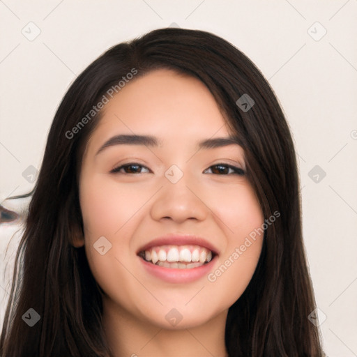 Joyful white young-adult female with long  black hair and brown eyes