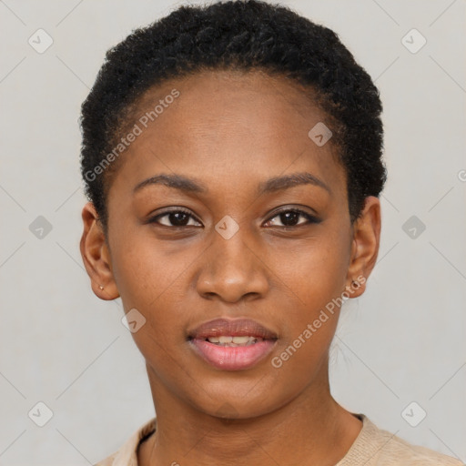 Joyful black young-adult female with short  brown hair and brown eyes