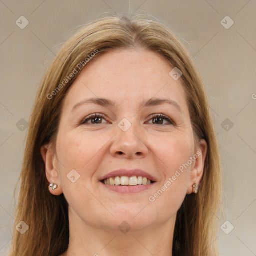 Joyful white adult female with medium  brown hair and brown eyes