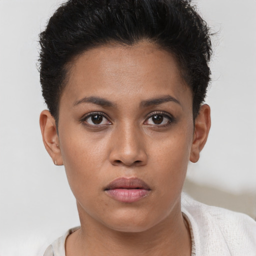 Neutral white young-adult female with short  brown hair and brown eyes