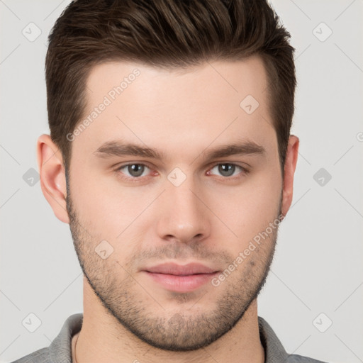 Neutral white young-adult male with short  brown hair and brown eyes