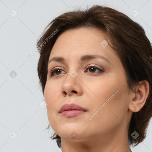 Neutral white young-adult female with medium  brown hair and brown eyes