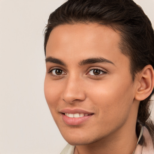 Joyful white young-adult female with short  brown hair and brown eyes