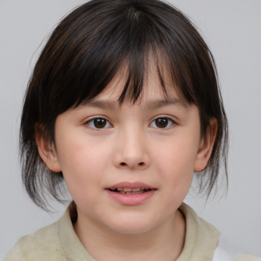 Joyful white child female with medium  brown hair and brown eyes