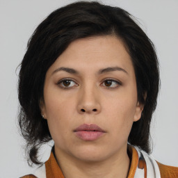 Neutral asian young-adult female with medium  brown hair and brown eyes