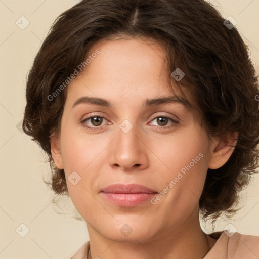 Joyful white young-adult female with medium  brown hair and green eyes