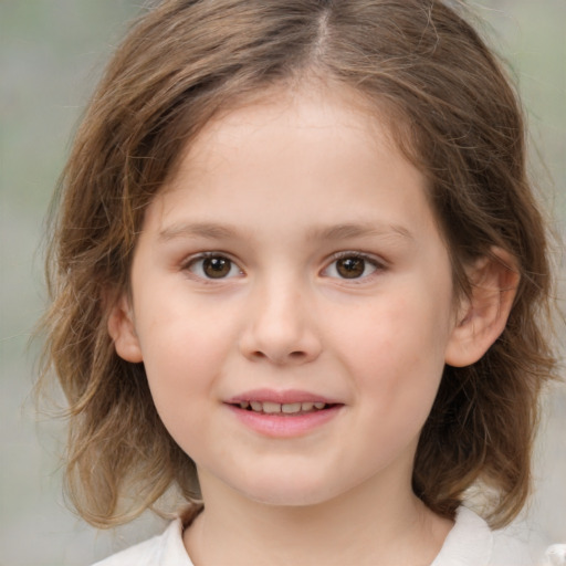 Joyful white child female with medium  brown hair and brown eyes