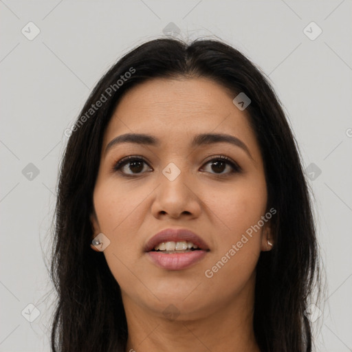 Joyful asian young-adult female with long  brown hair and brown eyes