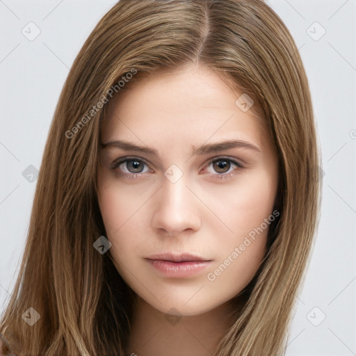 Neutral white young-adult female with long  brown hair and brown eyes