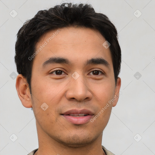 Joyful latino young-adult male with short  brown hair and brown eyes