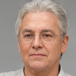 Neutral white middle-aged male with short  gray hair and brown eyes