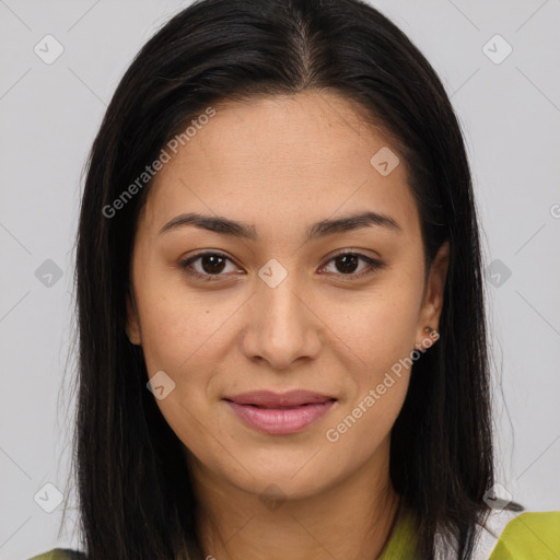 Joyful asian young-adult female with long  brown hair and brown eyes
