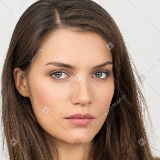 Neutral white young-adult female with long  brown hair and brown eyes