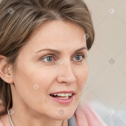 Joyful white young-adult female with medium  brown hair and blue eyes