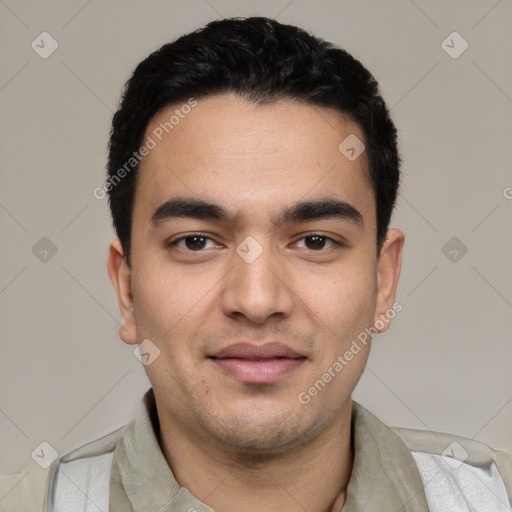 Joyful white young-adult male with short  black hair and brown eyes