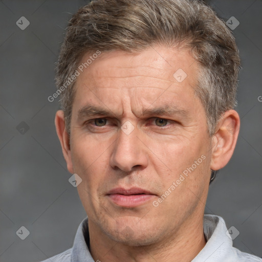 Joyful white middle-aged male with short  brown hair and brown eyes