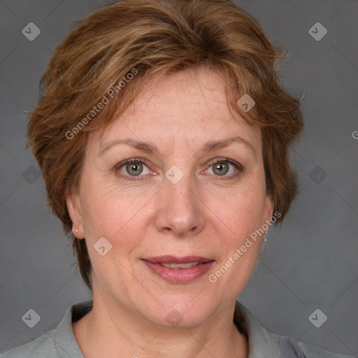 Joyful white adult female with medium  brown hair and grey eyes