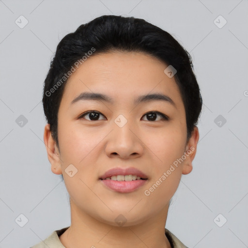 Joyful asian young-adult female with short  black hair and brown eyes