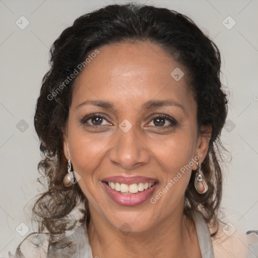 Joyful black adult female with medium  brown hair and brown eyes