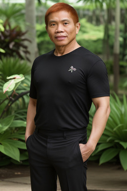 Filipino middle-aged male with  ginger hair