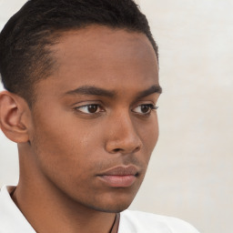 Neutral black young-adult male with short  brown hair and brown eyes