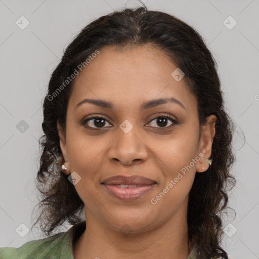 Joyful black young-adult female with medium  brown hair and brown eyes