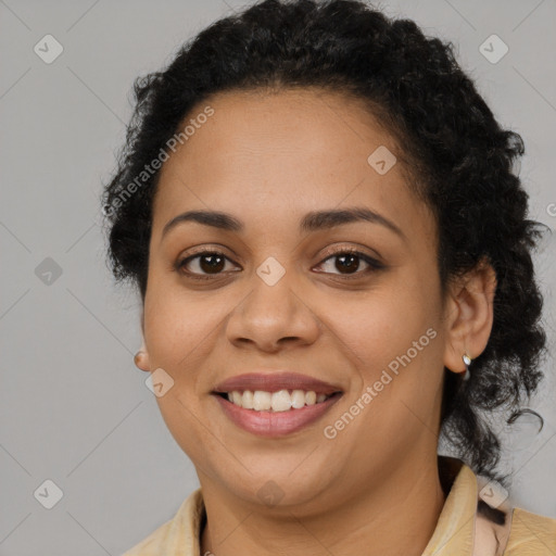 Joyful latino young-adult female with long  brown hair and brown eyes