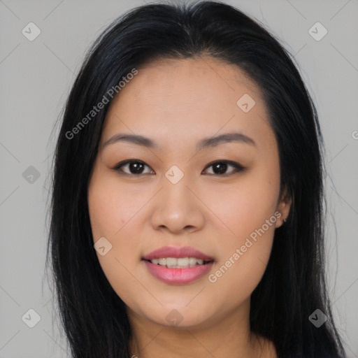 Joyful asian young-adult female with long  brown hair and brown eyes