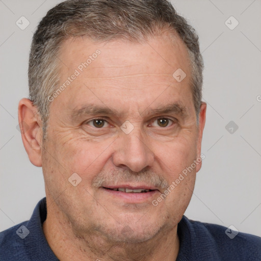 Joyful white middle-aged male with short  brown hair and brown eyes