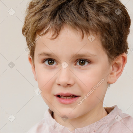 Joyful white child male with short  brown hair and brown eyes