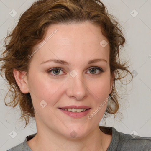 Joyful white young-adult female with medium  brown hair and blue eyes