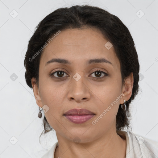 Joyful latino young-adult female with short  brown hair and brown eyes