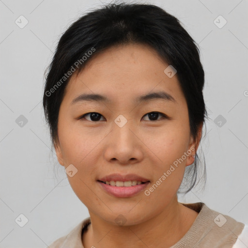 Joyful asian young-adult female with medium  brown hair and brown eyes