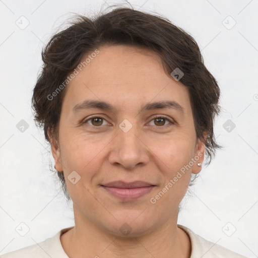 Joyful white adult female with short  brown hair and brown eyes