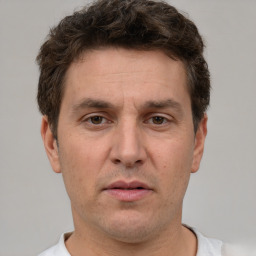 Neutral white adult male with short  brown hair and brown eyes