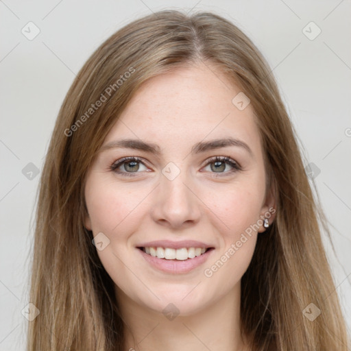 Joyful white young-adult female with long  brown hair and grey eyes