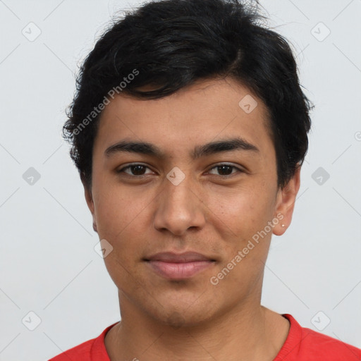 Joyful latino young-adult male with short  black hair and brown eyes