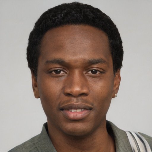 Neutral black young-adult male with short  black hair and brown eyes