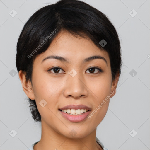 Joyful asian young-adult female with short  brown hair and brown eyes