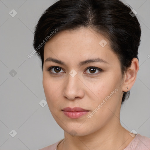 Joyful white young-adult female with short  brown hair and brown eyes