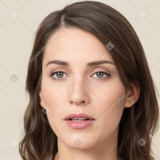 Neutral white young-adult female with long  brown hair and brown eyes