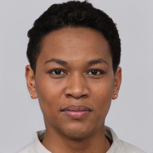 Joyful black young-adult female with short  black hair and brown eyes