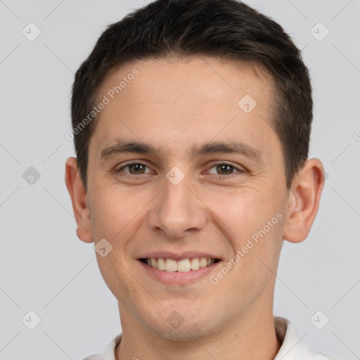 Joyful white young-adult male with short  brown hair and brown eyes