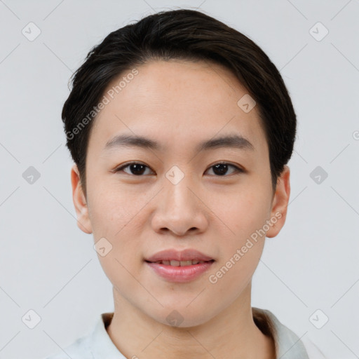 Joyful asian young-adult male with short  brown hair and brown eyes